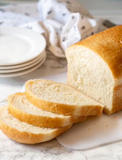 The best part about homemade bread is slicing it and eating!