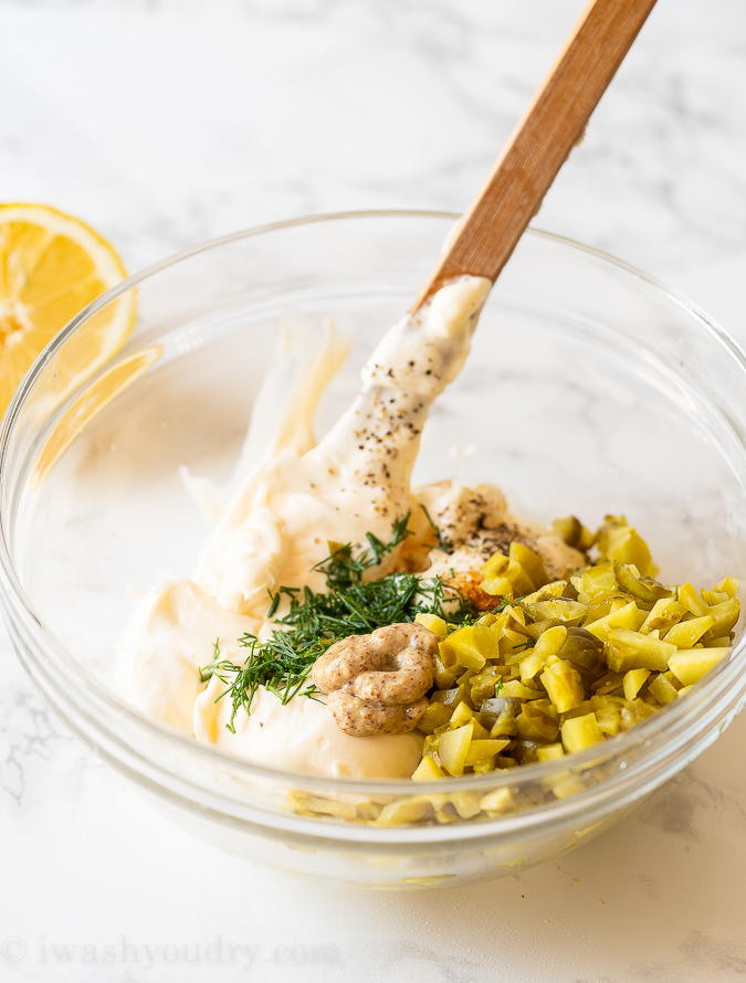 Basic ingredients needed to make homemade tartar sauce.