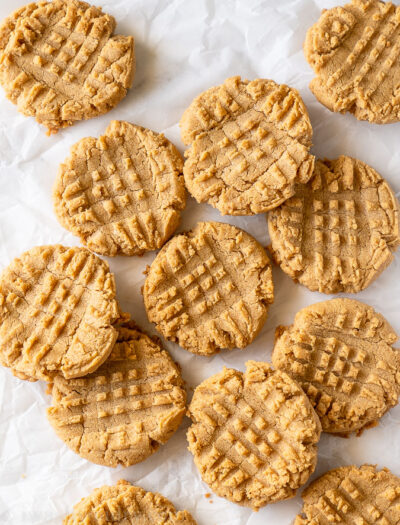 These 5 Ingredient Peanut Butter Cookies are so simple and quick to make. No flour, no chilling, resulting in a chewy, dense inside with a crisp cookie outside. 