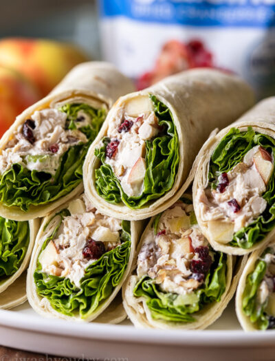 Plate full of sliced Chicken Apple Salad Wraps