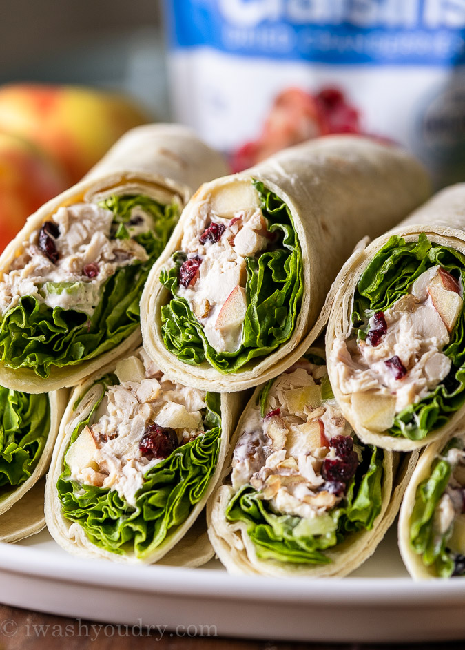 Plate full of sliced Chicken Apple Salad Wraps