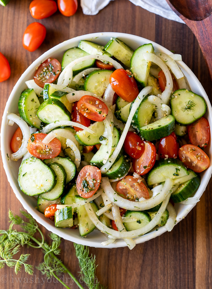 Delicious bowl filled with cucumber tomato onion salad