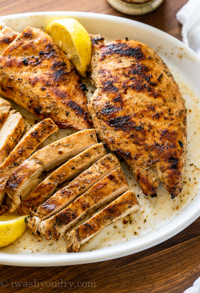 Juicy grilled chicken breast strips on a plate