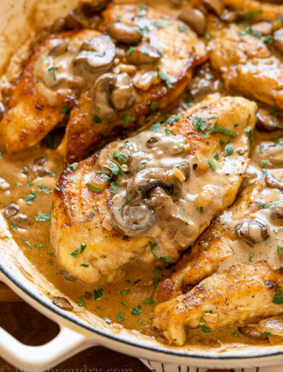 Real Italian Chicken Marsala in a pan with mushroom gravy.