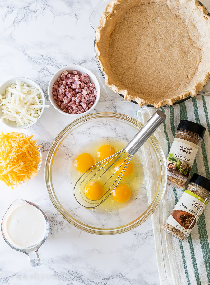 ingredients for ham quiche on table