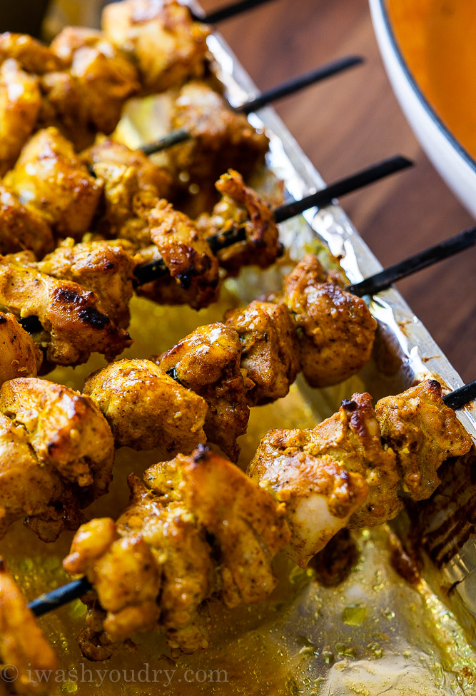 cooked chicken tikka masala on skewers