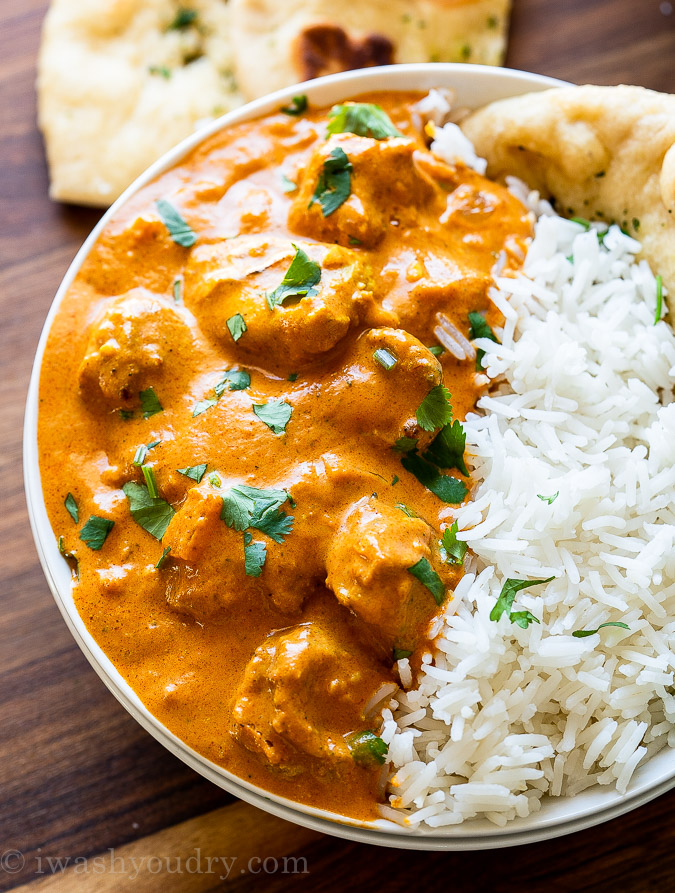 chicken tikka masala with basmati rice and naan bread