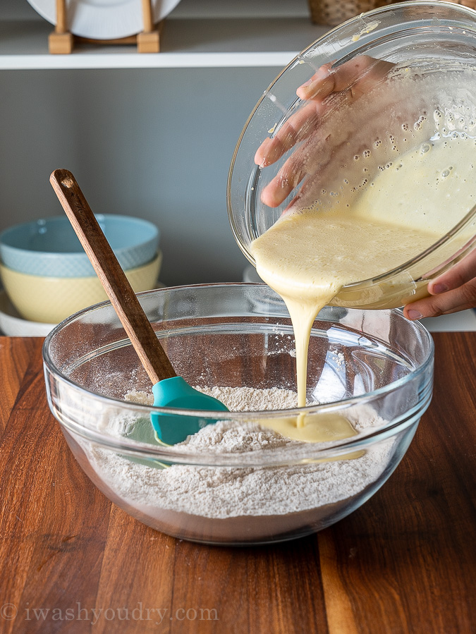 pour egg yolks into flour