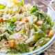 bowl of salad with pasta and dressing