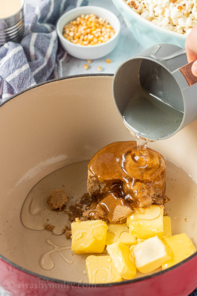 Corn syrup pouring into pan of brown sugar and butter. 