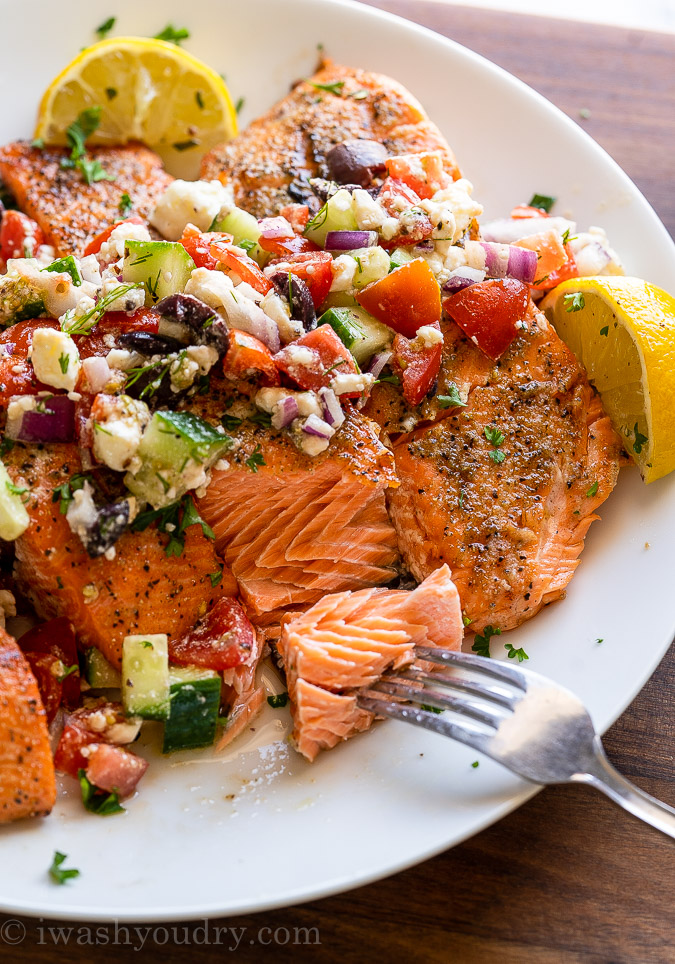 flaky salmon with greek salsa on top