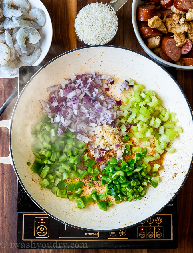 skillet full of vegetables with garlic