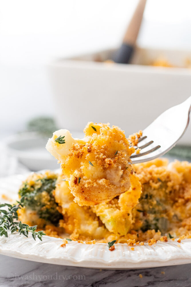 Baked Broccoli Cauliflower Casserole on a fork. 