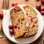 slices of banana bread on plate with icing