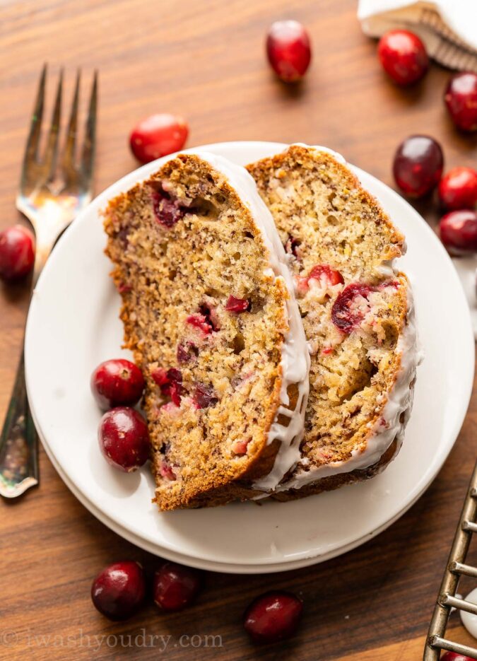 slices of banana bread on plate with icing