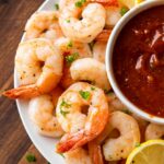 cooked shrimp with tails and parsley