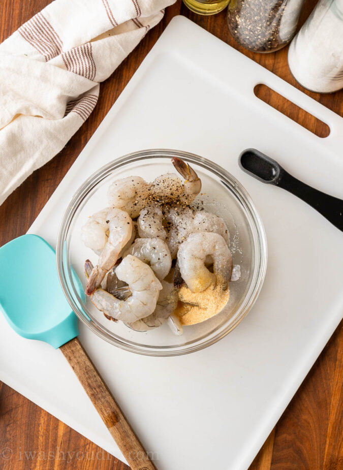 ingredients for shrimp in bowl with spatula