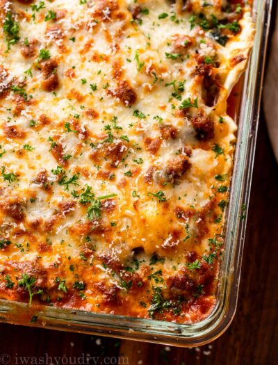 cheesy ravioli casserole in glass dish