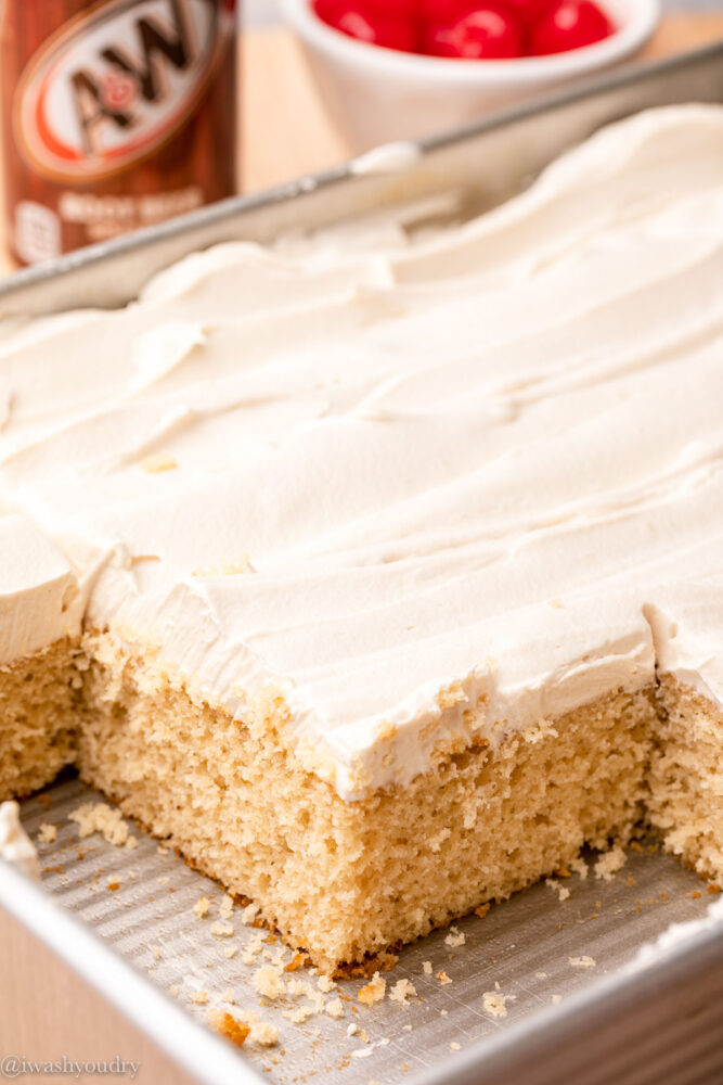 sliced cake in pan with frosting.