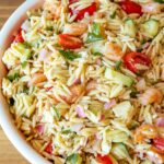 Shrimp Orzo Pasta in white bowl.