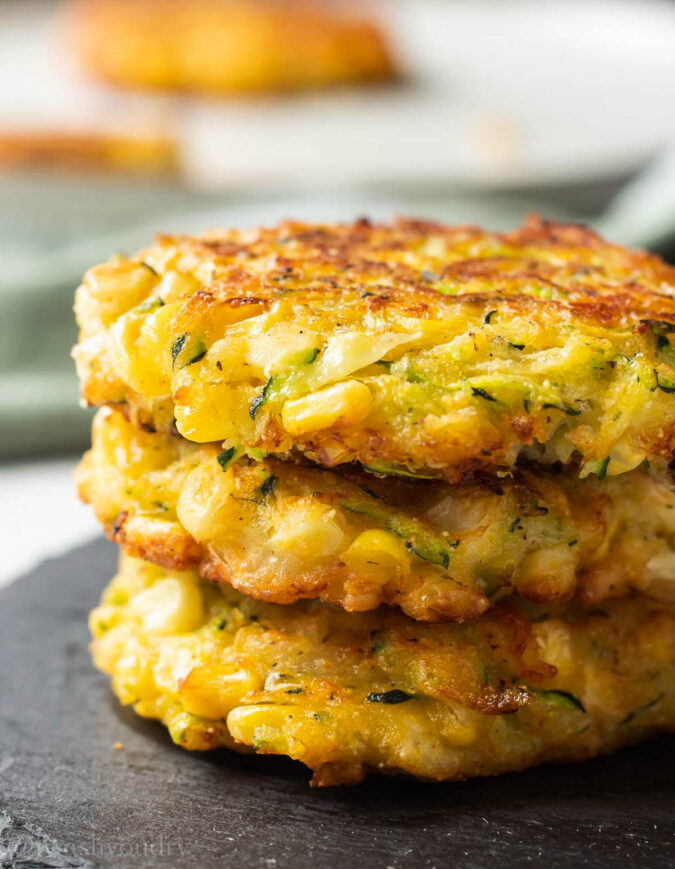 stack of fritters with zucchini and corn