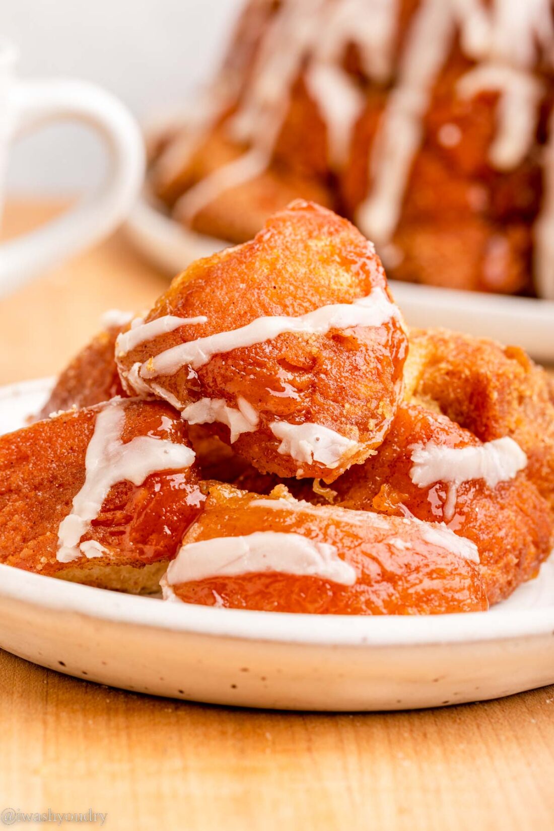 Baked pull apart monkey bread on white plate. 