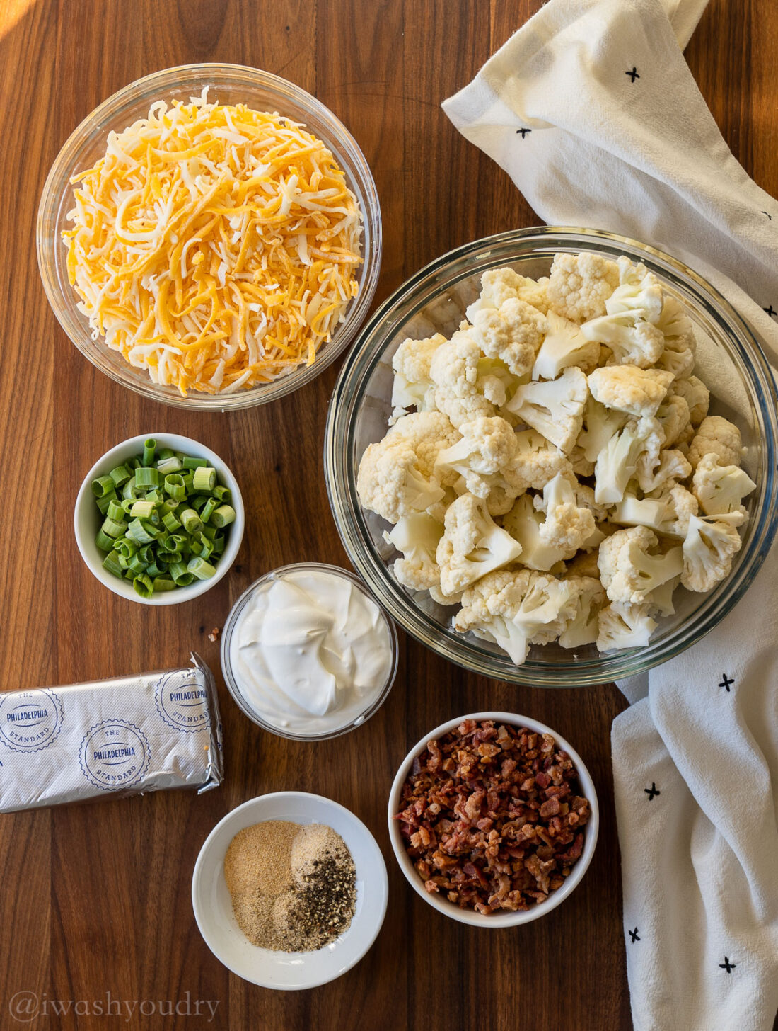 ingredients for cauliflower recipe on wooden table