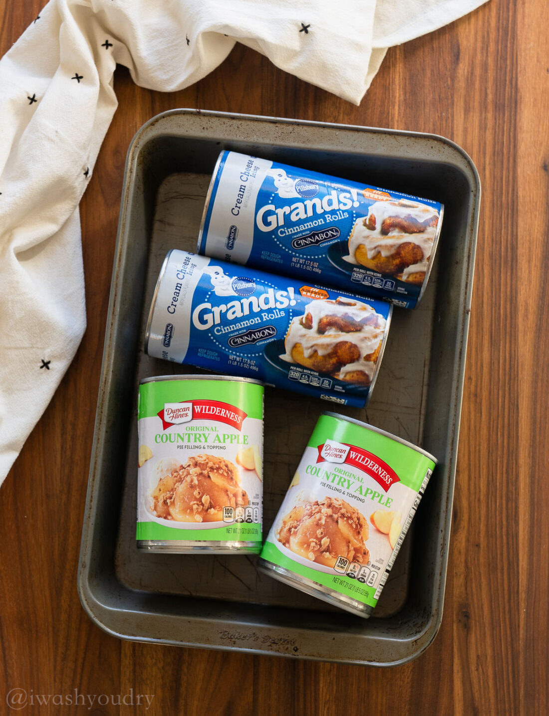 Ingredients for cinnamon roll bake in baking dish.