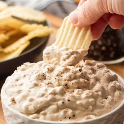 potato chip with onion chip dip on it.