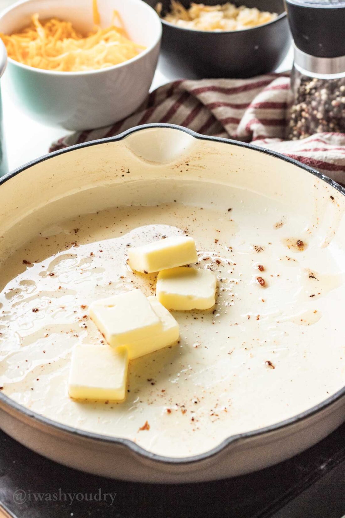 Butter in skillet with bacon grease. 