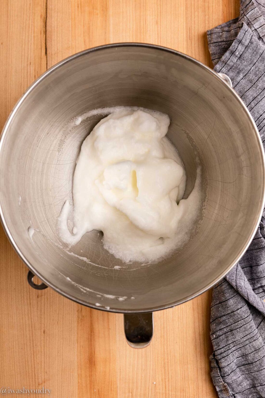 Beaten egg whites in metal bowl. 