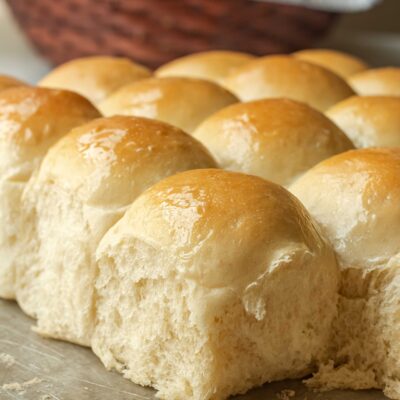 Baked Homemade Rolls on baking sheet.