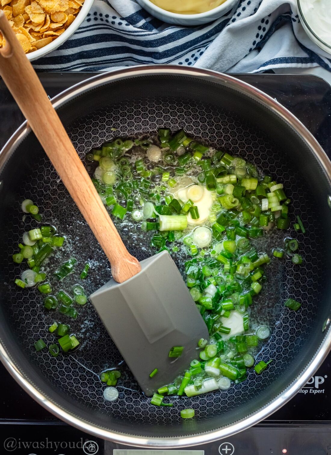 cooking onions with butter in pan.